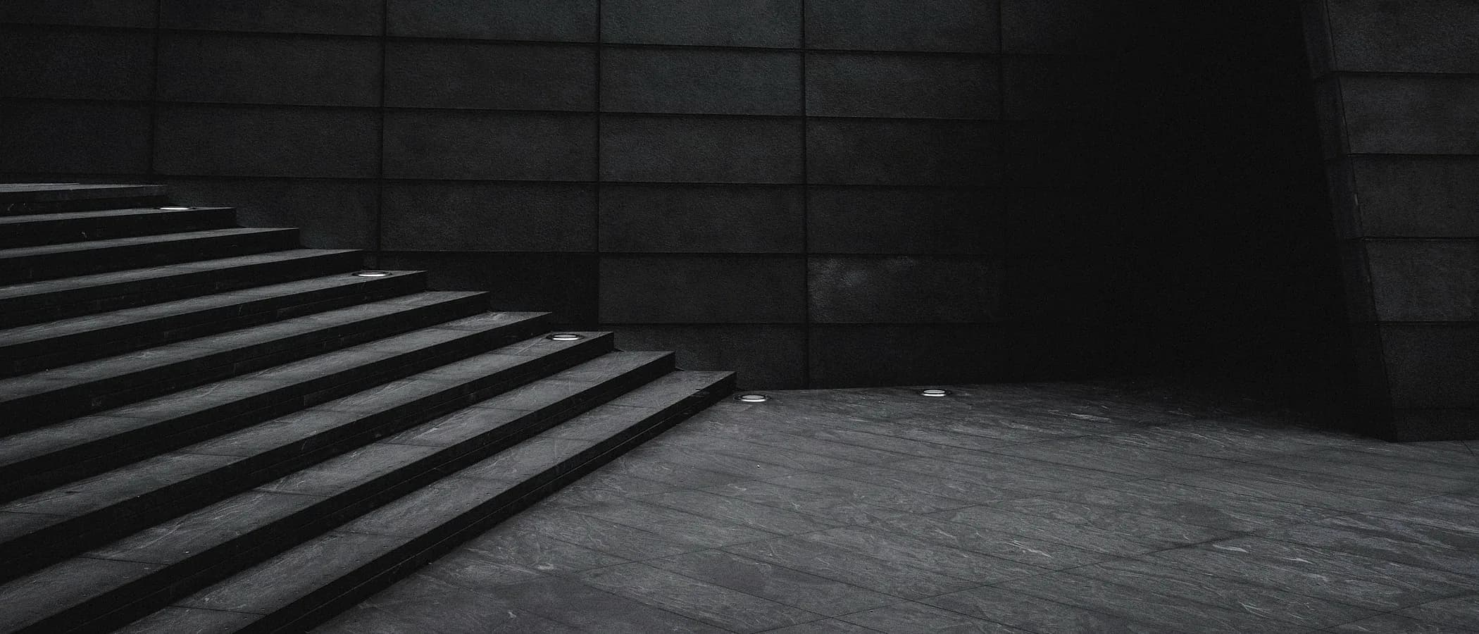 Concrete steps and wall, mass resolving into order