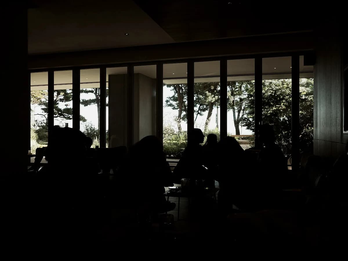 Colleagues working together in a lit interior